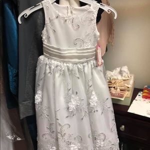 New with tags communion/flower girls dress.